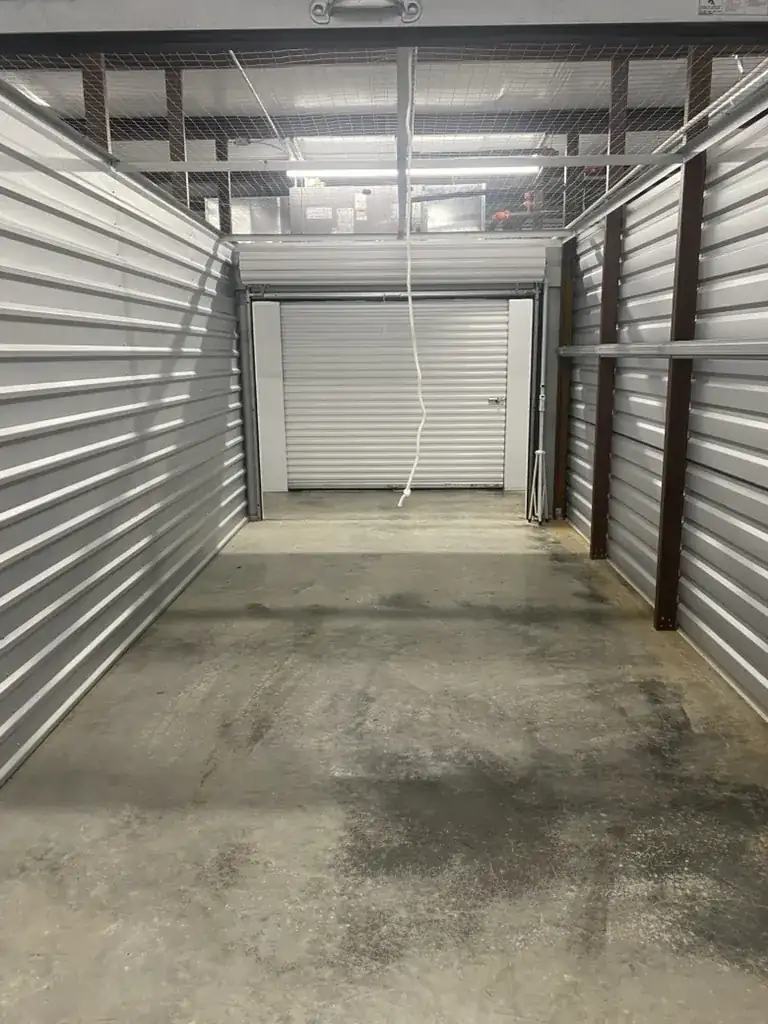 The same Auburn storage unit completely emptied and swept after a Toss It move-out cleanout