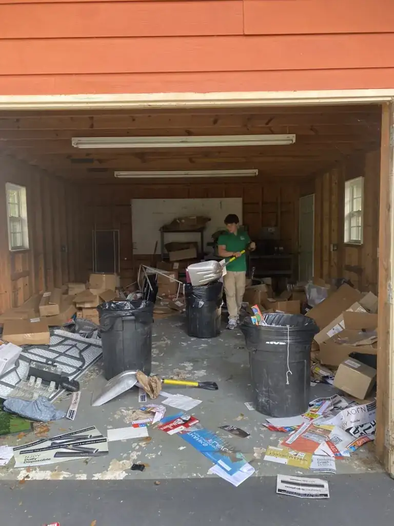 Toss It crew performing a whole-property cleanout in Auburn, Alabama