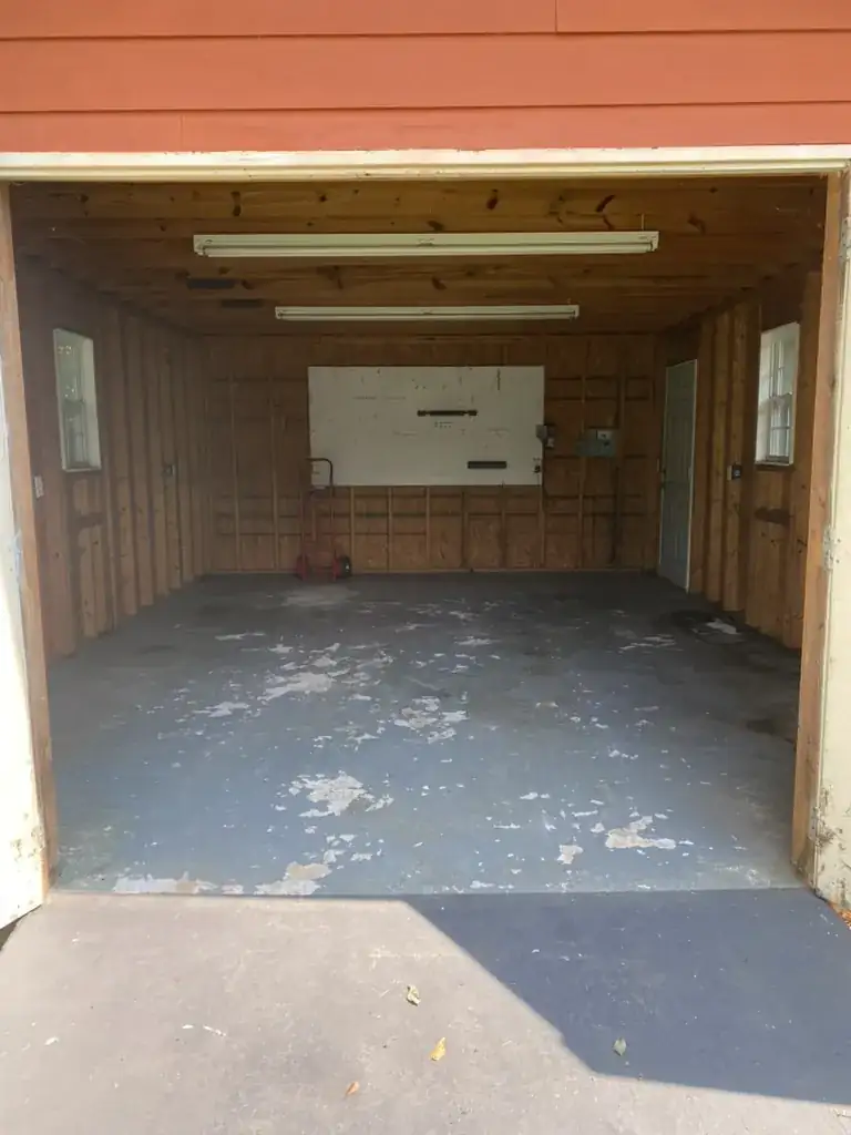 Auburn shed cleanout after - completely empty shed ready for pest treatment and equipment storage